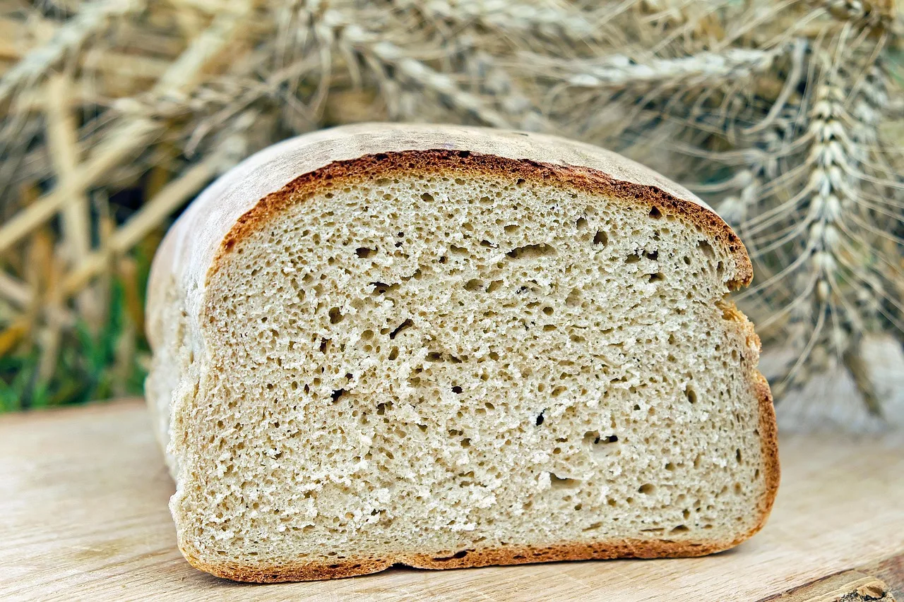 A sliced loaf of plain bread.