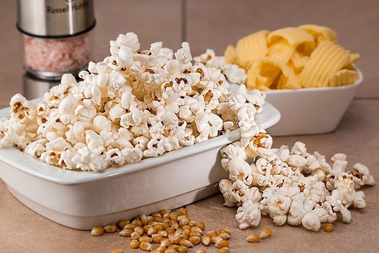 A bowl of plain popped popcorn.