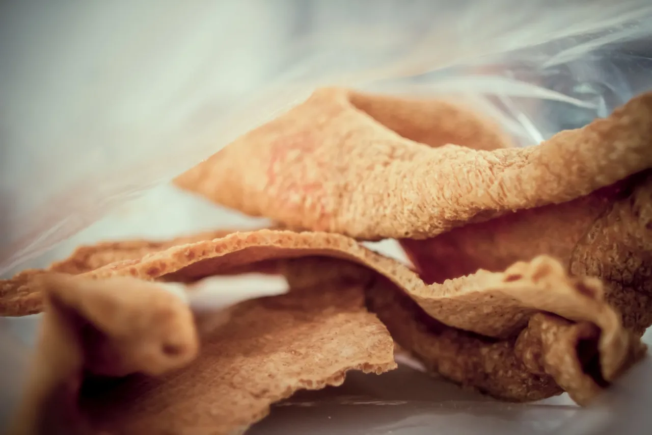 Crunchy golden pork rinds (chicharrones).